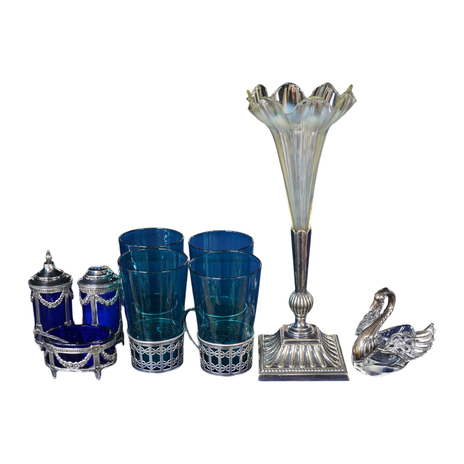 Four coloured glasses with silver stands a similar glass swan salt, a three piece cruet with white metal mounts and a plated single stem epergne, glasses and stands 9cm high., Condition - good